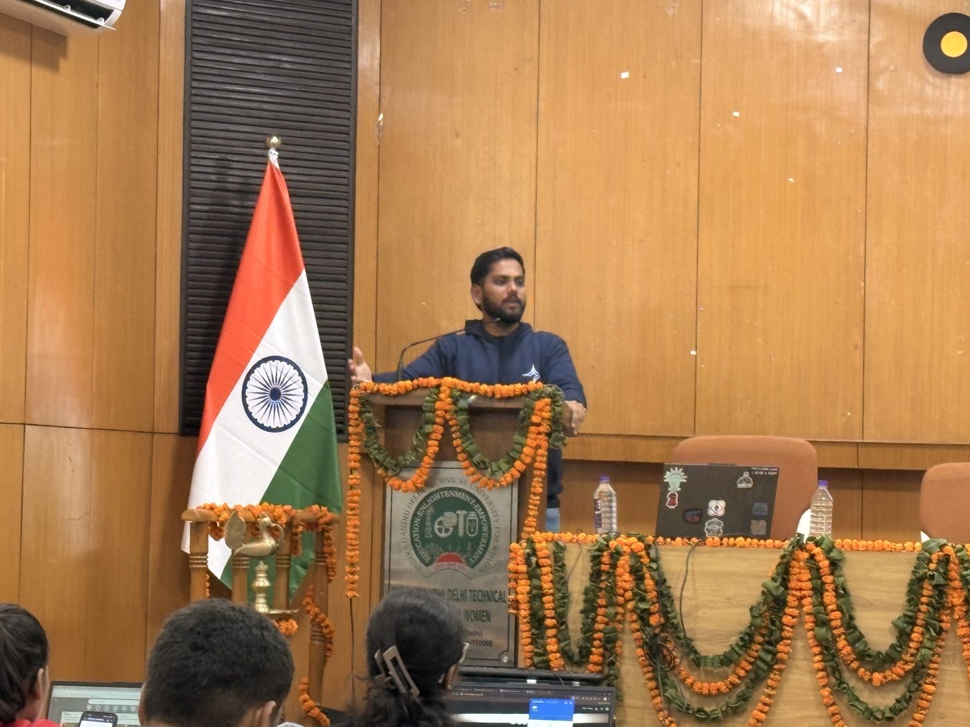 Nithin speaking from a podium